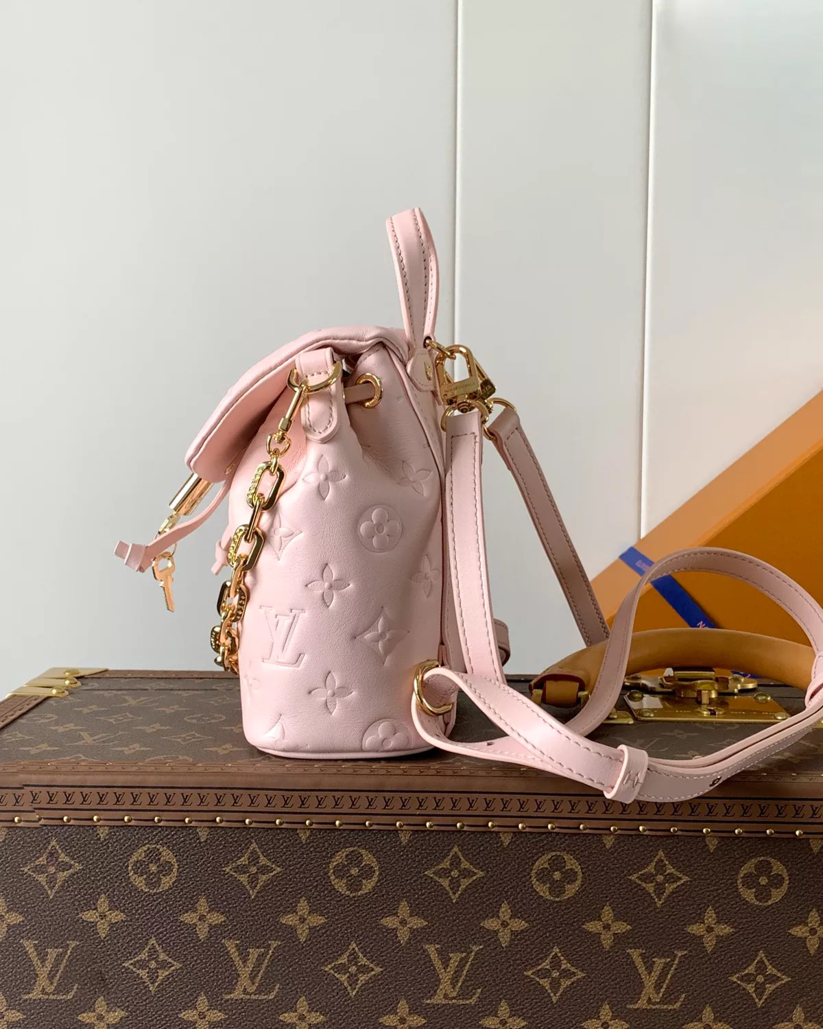Coussin Backpack Mini in Jasmine Pink lambskin leather with Monogram pattern.