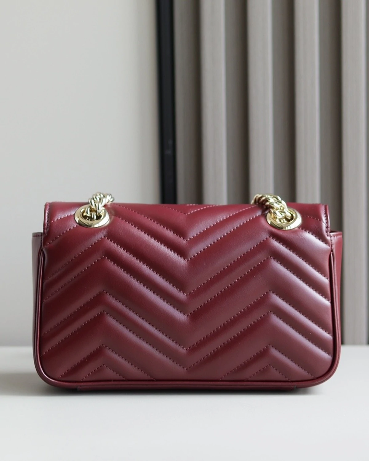 GG Marmont small shoulder bag “Rosso Ancora red leather”