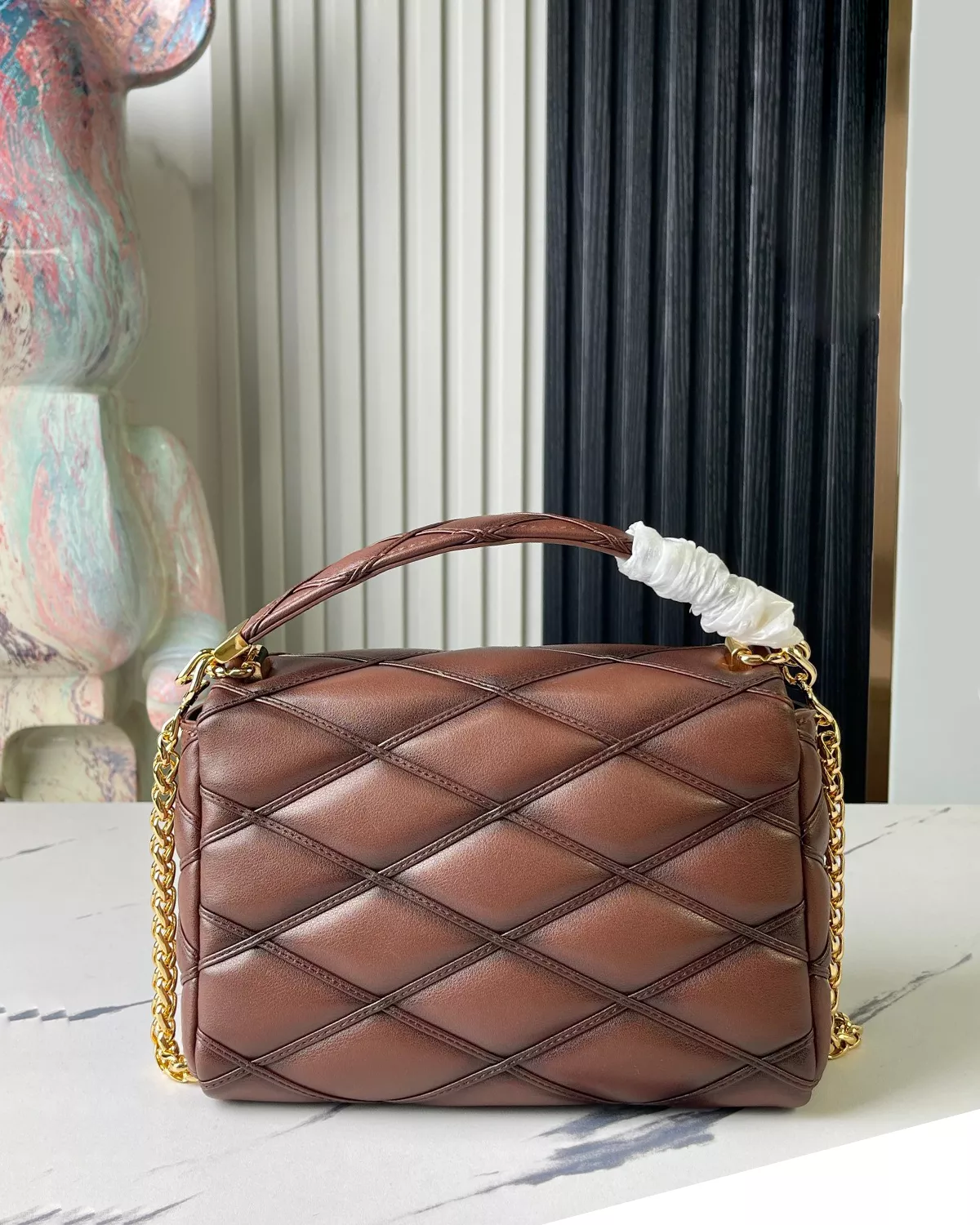 GO-14 MM in Smoked Tan quilted lambskin leather with toasted effect.