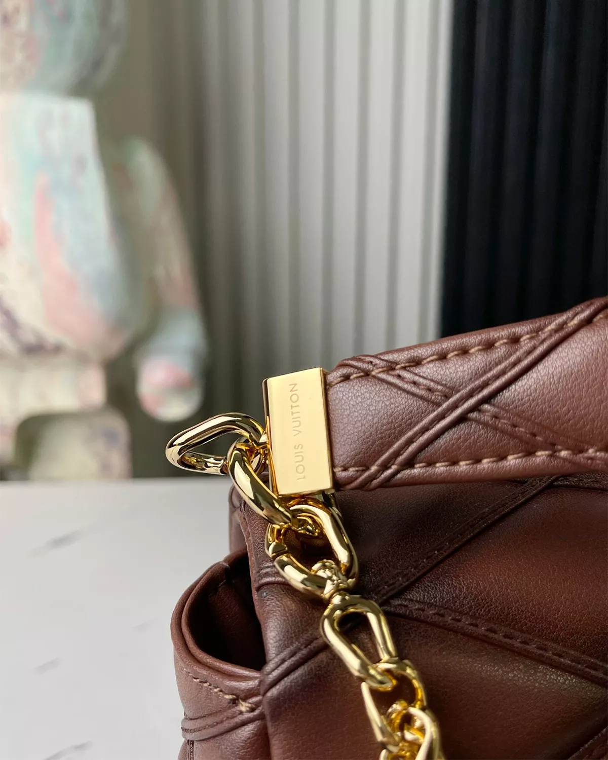 GO-14 MM in Smoked Tan quilted lambskin leather with toasted effect.