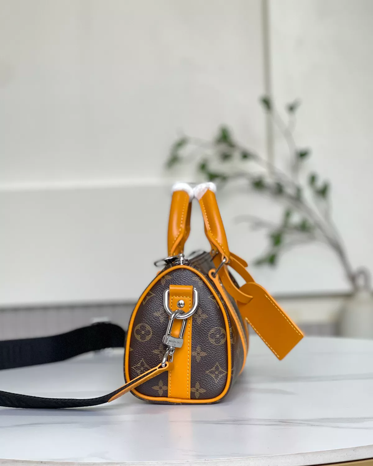 Keepall Bandoulière 25 bag in calf leather with oversized Monogram print.