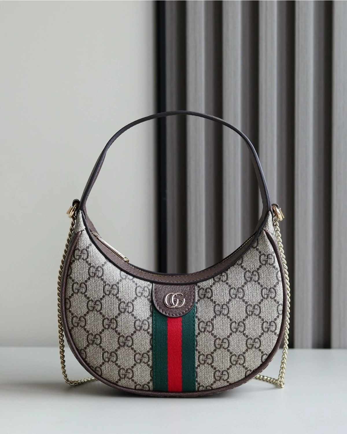 Ophidia small shoulder bag “Brown”