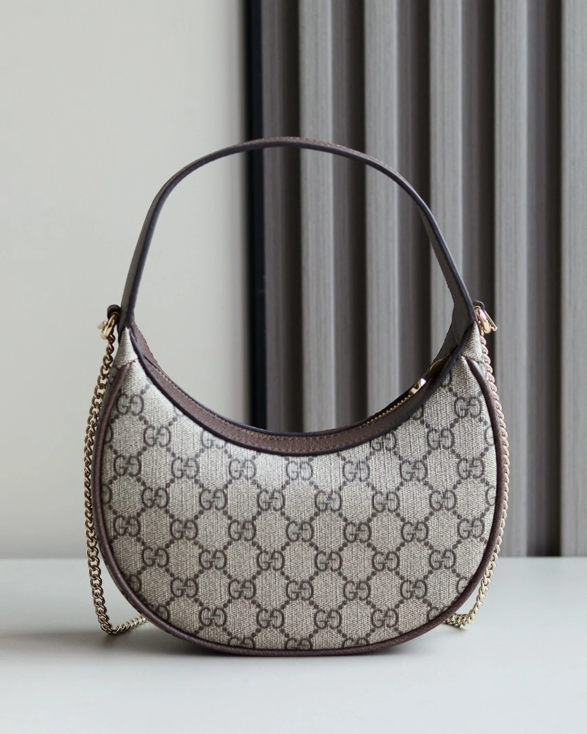 Ophidia small shoulder bag “Brown”