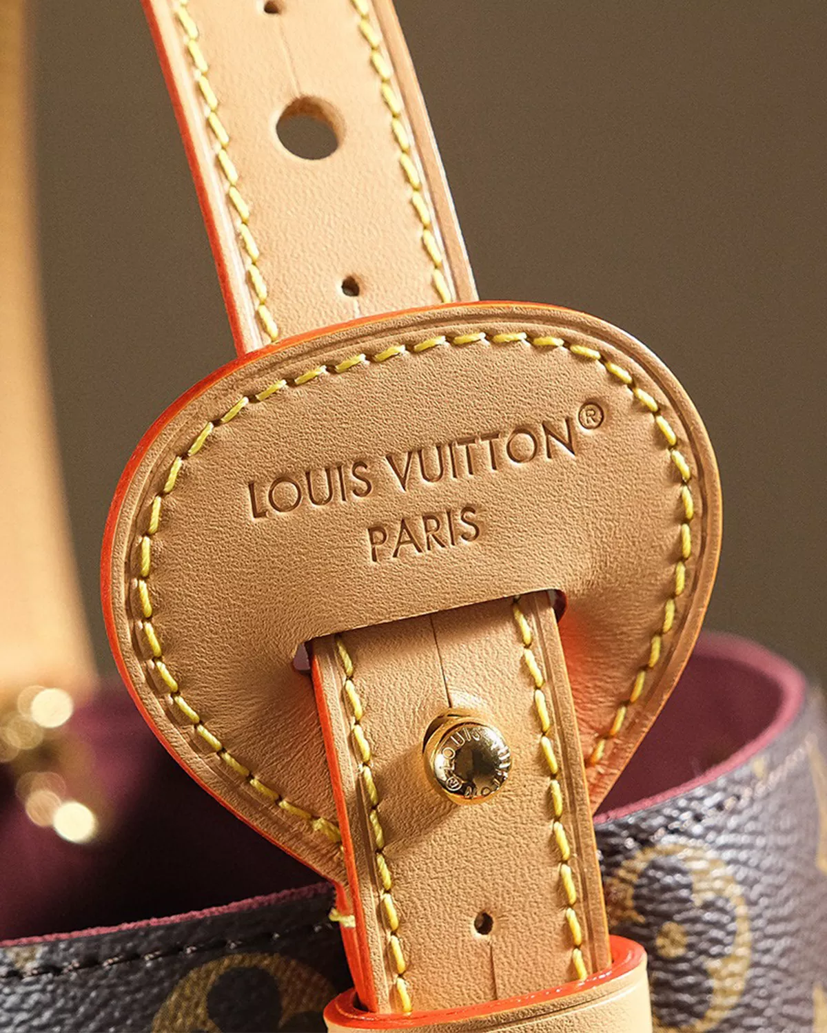 Rebce All In BB monogram canvas crossbody bag with gold hardware and foldable design.