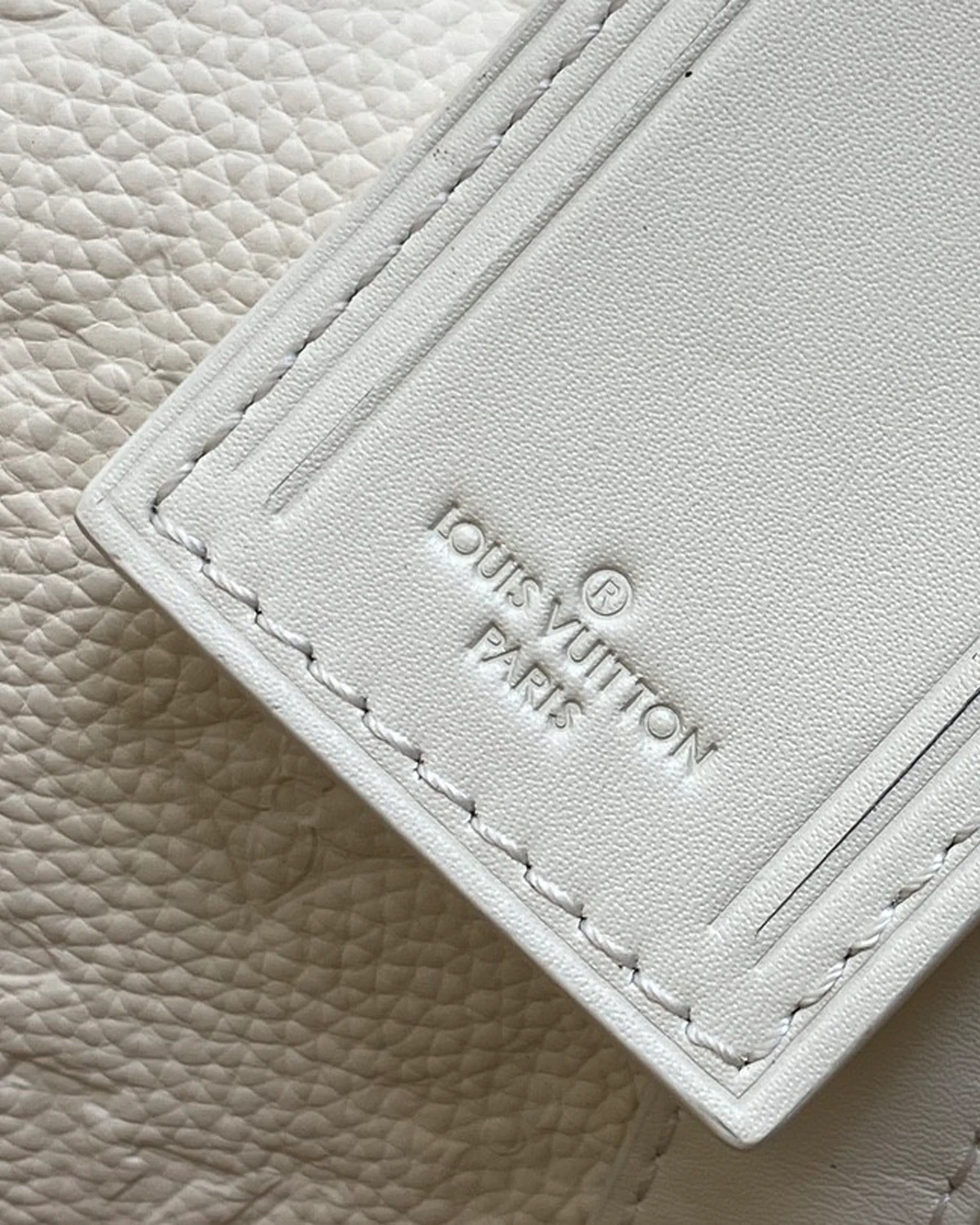 Keepall Bandoulière 25 “Monogram Taurillon Leather White”