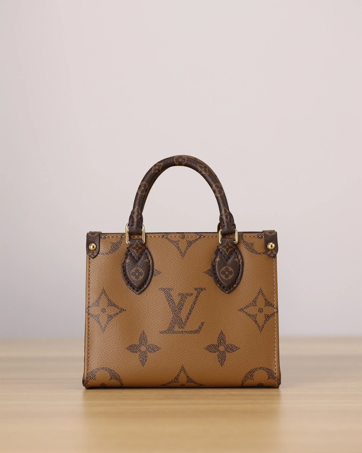 OnTheGo BB “Monogram Reverse”