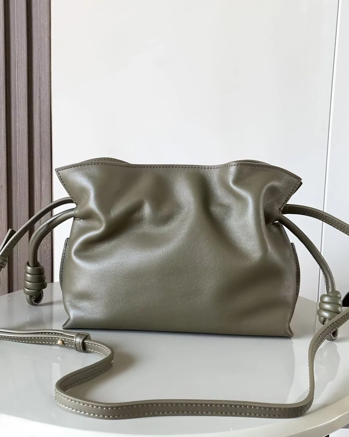 Mini Flamenco clutch in nappa calfskin “Dark Khaki”