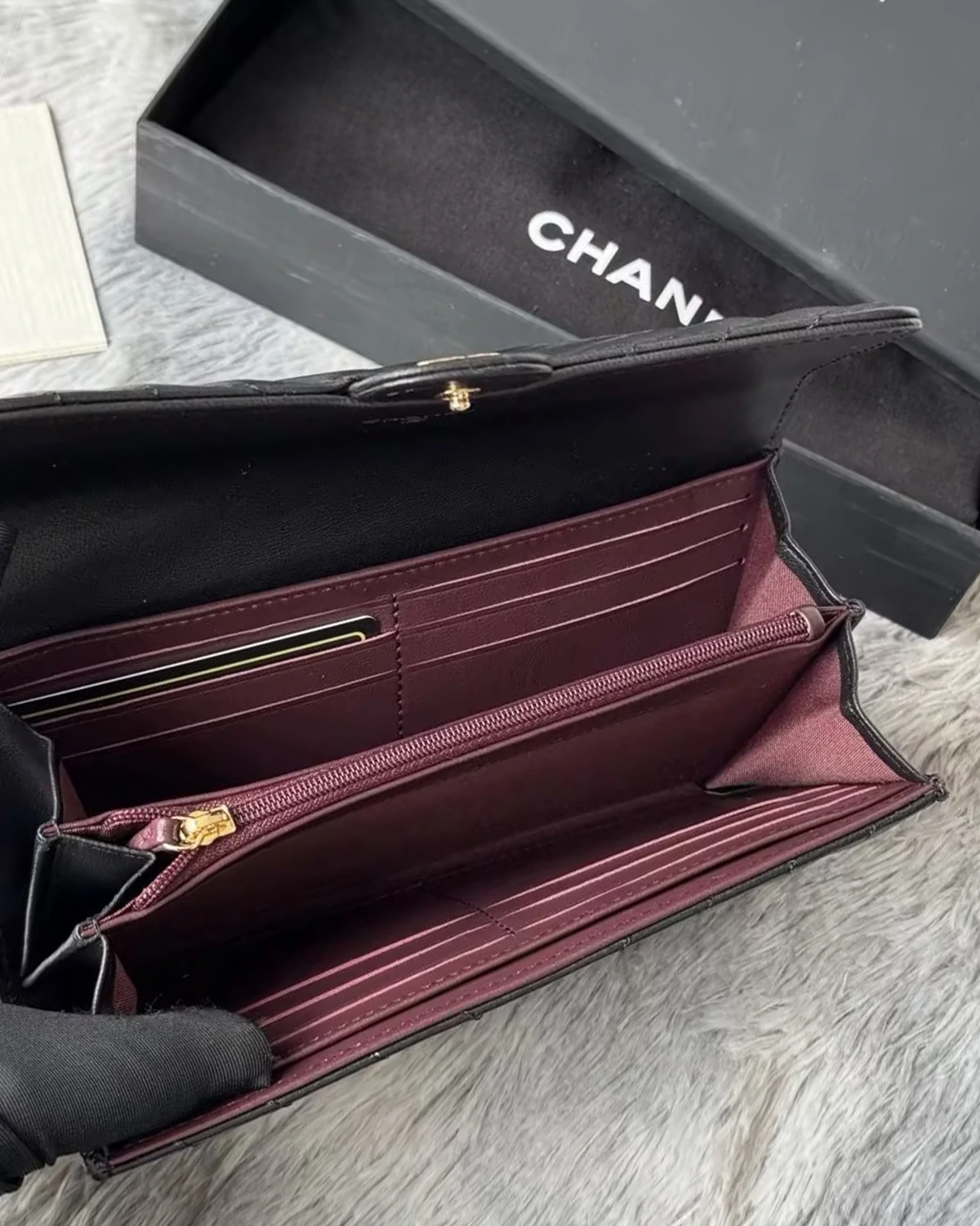 black-chevron-quilted-leather-long-wallet