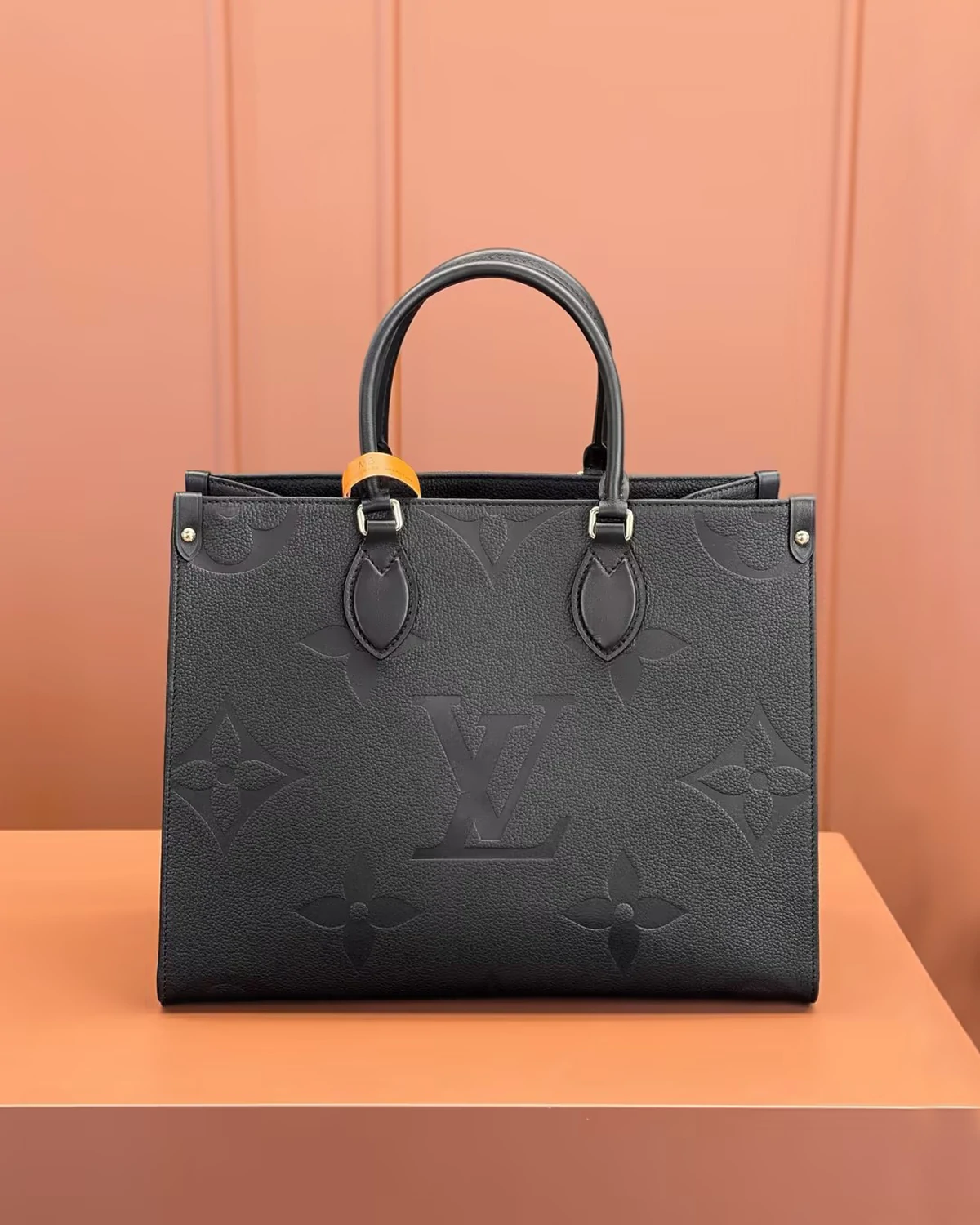 OnTheGo MM “Monogram Empreinte Leather Black”