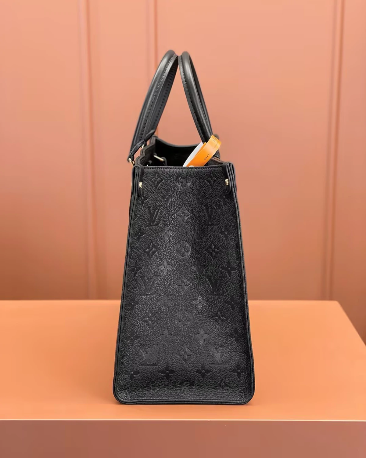 OnTheGo MM “Monogram Empreinte Leather Black”
